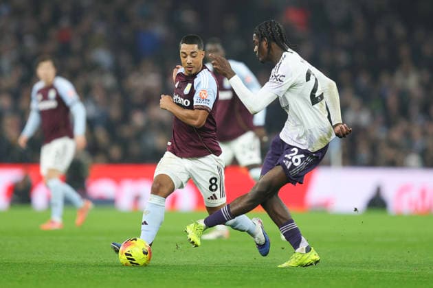 Birmingham, England, 21st December 2025. Ayden Heaven of Manchester United, ManU and Youri Tielemans of Aston Villa during the Aston Villa vs Manchester United Premier League match at Villa Park, Birmingham. Picture credit should read: James Baylis Sportimage EDITORIAL USE ONLY. No use with unauthorised audio, video, data, fixture lists, club league logos or live services. Online in-match use limited to 120 images, no video emulation. No use in betting, games or single club league player publications. SPI_013_JB_ASTON_VILLA_MANUTD SPI-4388-0013