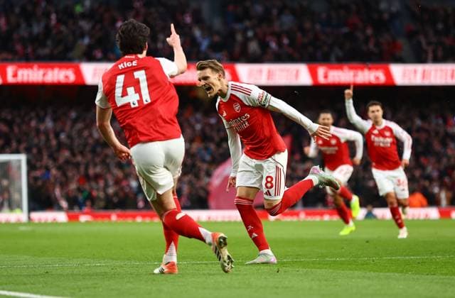 Martin Odegaard of Arsenal celebrates scoring the opening goal Arsenal v Brighton and Hove Albion, Premier League, Football, Emirates Stadium, London, UK - 27 Dec 2025London Emirates Stadium United Kingdom EDITORIAL USE ONLY No use with unauthorised audio, video, data, fixture lists, club league logos or live services. Online in-match use limited to 120 images, no video emulation. No use in betting, games or single club league player publications. Copyright: xMichaelxZemanek Shutterstockx 16213159g