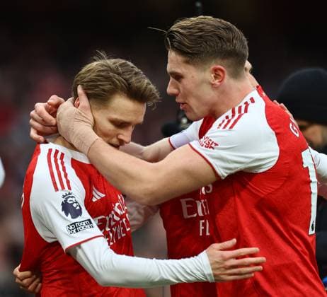 Martin Odegaard of Arsenal celebrates scoring the opening goal with team-mate Viktor Gyokeres of Arsenal Arsenal v Brighton and Hove Albion, Premier League, Football, Emirates Stadium, London, UK - 27 Dec 2025London Emirates Stadium United Kingdom EDITORIAL USE ONLY No use with unauthorised audio, video, data, fixture lists, club league logos or live services. Online in-match use limited to 120 images, no video emulation. No use in betting, games or single club league player publications. Copyright: xMichaelxZemanek Shutterstockx 16213159h