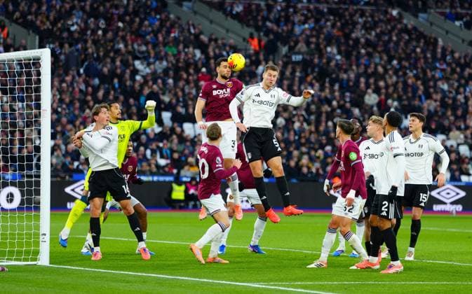Max Kilman of West Ham United heads a corner away under pressure from Joachim Andersen of Fulham West Ham United v Fulham, Premier League, Football, London Stadium, London, UK - 27 Dec 2025London London Stadium United Kingdom EDITORIAL USE ONLY No use with unauthorised audio, video, data, fixture lists, club league logos or live services. Online in-match use limited to 120 images, no video emulation. No use in betting, games or single club league player publications. Copyright: xJavierxGarcia Shutterstockx 16213164af
