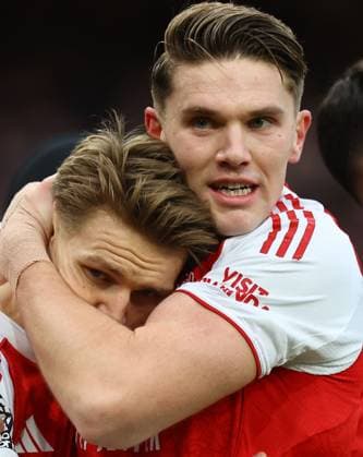 Martin Odegaard of Arsenal celebrates scoring their sides first goal with team-mate Viktor Gyokeres of Arsenal Arsenal v Brighton and Hove Albion, Premier League, Football, Emirates Stadium, London, UK - 27 Dec 2025London Emirates Stadium United Kingdom EDITORIAL USE ONLY No use with unauthorised audio, video, data, fixture lists, club league logos or live services. Online in-match use limited to 120 images, no video emulation. No use in betting, games or single club league player publications. Copyright: xMichaelxZemanek Shutterstockx 16213159n
