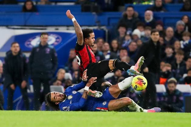 Justin Kluivert of AFC Bournemouth is tackled by Malo Gusto of Chelsea Chelsea v AFC Bournemouth, Football, Premier League, Stamford Bridge, London, UK, 30 12 25 EDITORIAL USE ONLY No use with unauthorised audio, video, data, fixture lists (outside the EU), club league logos or live services. Online in-match use limited to 45 images (+15 in extra time). No use to emulate moving images. No use in betting, games or Copyright: xAnthonyxHanc Shutterstockx 16218122ad