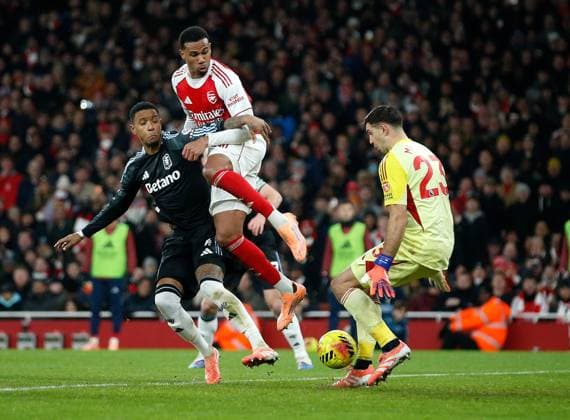 Gabriel of Arsenal sneaks in between Aston Villa defender Ezri Konsa and goalkeeper Emiliano Martinez Arsenal v Aston Villa, Football, Premier League, Emirates Stadium, London, UK - 30 12 2025 EDITORIAL USE ONLY No use with unauthorised audio, video, data, fixture lists (outside the EU), club league logos or live services. Online in-match use limited to 45 images (+15 in extra time). No use to emulate moving images. No use in betting, games or Copyright: xMattxImpey Shutterstockx 16218191as