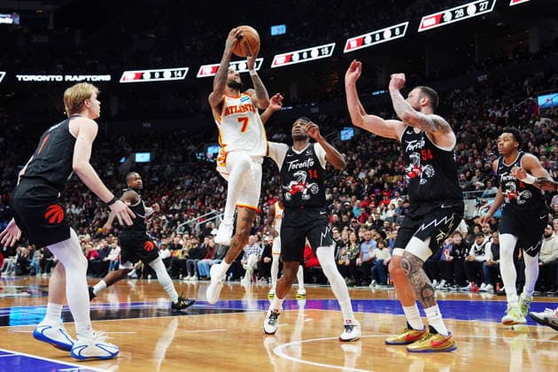 January 3, 2026, Toronto, On, Canada: Atlanta Hawks Nickeil Alexander-Walker (7) shoots as Toronto Raptors Gradey Dick (left), Ja Kobe Walter (14) and Sandro Mamukelashvili (54) defend during second half NBA, Basketball Herren, USA basketball action in Toronto on Saturday, Jan. 3, 2026. Canada News - January 3, 2026 - ZUMAc35_ 20260103_zaf_c35_086 Copyright: xFrankxGunnx
