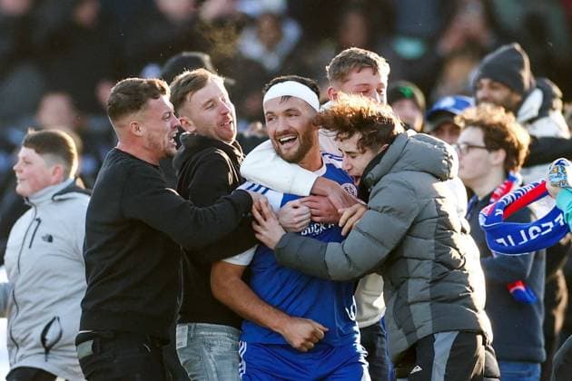 Paul Dawson of Macclesfield FC is mobbed by fans on the final whistle. Macclesfield v Crystal Palace, Emirates FA Cup, Third Round, Football, Leasing.com Stadium, Macclesfield, UK - 10 Jan 2026Macclesfield Moss Rose United Kingdom EDITORIAL USE ONLY No use with unauthorised audio, video, data, fixture lists, club league logos or live services. Online in-match use limited to 120 images, no video emulation. No use in betting, games or single club league player publications. Copyright: xRyanxBrowne Shutterstockx 16246200de
