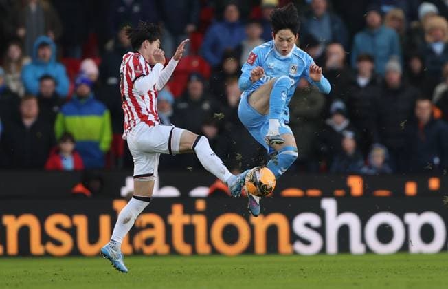 Yang Min-hyeok of Coventry City is fouled by Tatsuki Seko of Stoke City Stoke City v Coventry City, Emirates FA Cup, Third Round, Football, Bet365 Stadium, Stoke-on-Trent, UK - 10 Jan 2026Stoke-on-Trent Bet365 Stadium United Kingdom EDITORIAL USE ONLY No use with unauthorised audio, video, data, fixture lists, club league logos or live services. Online in-match use limited to 120 images, no video emulation. No use in betting, games or single club league player publications. Copyright: xKieranxMcManus Shutterstockx 16246248cc