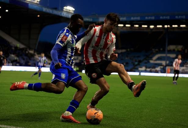 Sean Fusire of Sheffield Wednesday in action against Aaron Hickey of Brentford Sheffield Wednesday v Brentford, Emirates FA Cup, Third Round, Football, Hillsborough, Sheffield, UK - 10 Jan 2026Sheffield Hillsborough United Kingdom EDITORIAL USE ONLY No use with unauthorised audio, video, data, fixture lists, club league logos or live services. Online in-match use limited to 120 images, no video emulation. No use in betting, games or single club league player publications. Copyright: xGeorgexTewkesbury Shutterstockx 16246263ca