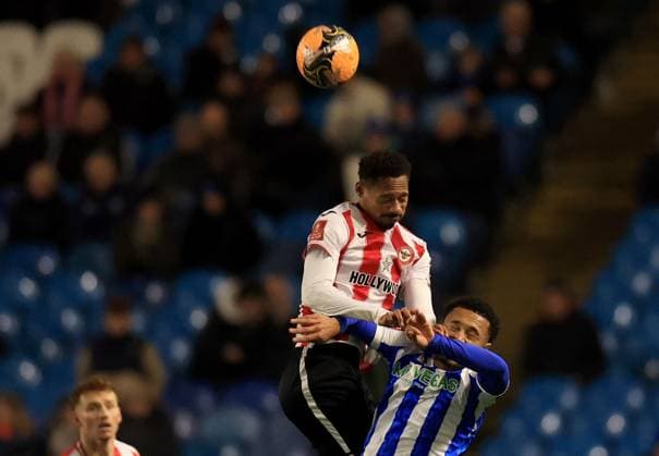 Ethan Pinnock of Brentford in action against Devlan Moses of Sheffield Wednesday Sheffield Wednesday v Brentford, Emirates FA Cup, Third Round, Football, Hillsborough, Sheffield, UK - 10 Jan 2026Sheffield Hillsborough United Kingdom EDITORIAL USE ONLY No use with unauthorised audio, video, data, fixture lists, club league logos or live services. Online in-match use limited to 120 images, no video emulation. No use in betting, games or single club league player publications. Copyright: xGeorgexTewkesbury Shutterstockx 16246263ce