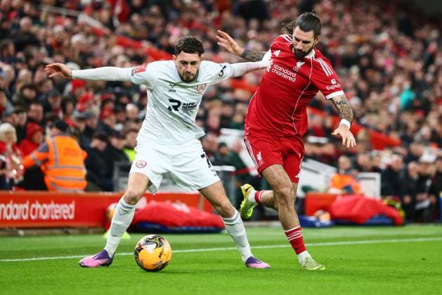 Dominik Szoboszlai of Liverpool and Caylan Vickers of Barnsley Liverpool v Barnsley, Emirates FA Cup, Third Round, Football, Anfield, Liverpool, UK - 12 Jan 2026Liverpool Anfield United Kingdom EDITORIAL USE ONLY No use with unauthorised audio, video, data, fixture lists, club league logos or live services. Online in-match use limited to 120 images, no video emulation. No use in betting, games or single club league player publications. Copyright: xPaulxCurrie Shutterstockx 16246339s