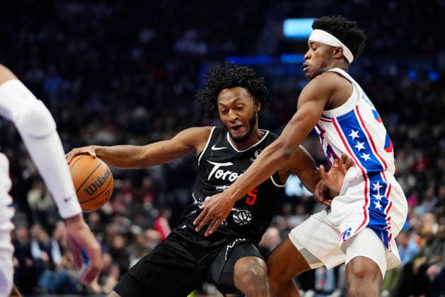 January 12, 2026, Toronto, On, CANADA: Toronto Raptors guard Immanuel Quickley (5) moves the ball under pressure from Philadelphia 76ers guard Vj Edgecombe (77) during first half NBA, Basketball Herren, USA basketball action in Toronto, Monday, Jan. 12, 2026. Canada News - January 12, 2026 - ZUMAc35_ 20260112_zaf_c35_067 Copyright: xFrankxGunnx