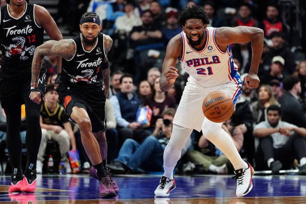 January 12, 2026, Toronto, On, CANADA: Toronto Raptors forward Brandon Ingram (3) and Philadelphia 76ers centre forward Joel Embiid (21) vie for a loose ball during first half NBA, Basketball Herren, USA basketball action in Toronto, Monday, Jan. 12, 2026. Canada News - January 12, 2026 - ZUMAc35_ 20260112_zaf_c35_073 Copyright: xFrankxGunnx