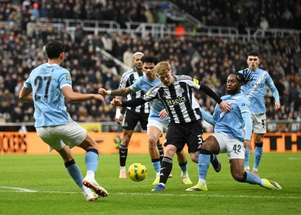 Antoine Semenyo of Manchester City challenges Lewis Hall of Newcastle United Newcastle United v Manchester City, EFL Carabao Cup, Semi Final, First Leg, Football, St James Park, Newcastle, UK - 13 Jan 2026Newcastle St James Park United Kingdom EDITORIAL USE ONLY No use with unauthorised audio, video, data, fixture lists, club league logos or live services. Online in-match use limited to 120 images, no video emulation. No use in betting, games or single club league player publications. Copyright: xRichardxLee Shutterstockx 16302979az