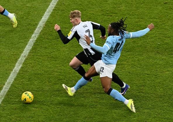 Lewis Hall of Newcastle United and Antoine Semenyo of Manchester City Newcastle United v Manchester City, EFL Carabao Cup, Semi Final, First Leg, Football, St James Park, Newcastle, UK - 13 Jan 2026Newcastle St James Park United Kingdom EDITORIAL USE ONLY No use with unauthorised audio, video, data, fixture lists, club league logos or live services. Online in-match use limited to 120 images, no video emulation. No use in betting, games or single club league player publications. Copyright: xAnnaxGowthorpe Shutterstockx 16302980q
