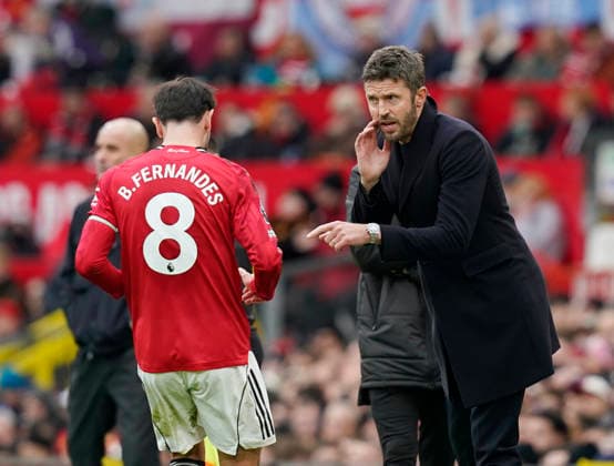 Manchester, England, 17th January 2026. Michael Carrick head coach of Manchester United, ManU (r) instructs Bruno Fernandes of Manchester United (l) during the Manchester United vs Manchester City Premier League match at Old Trafford, Manchester. Picture credit should read: Andrew Yates Sportimage EDITORIAL USE ONLY. No use with unauthorised audio, video, data, fixture lists, club league logos or live services. Online in-match use limited to 120 images, no video emulation. No use in betting, games or single club league player publications. SPI_060_AY_ManUtd_ManCity SPI-4456-0059