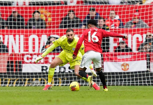 Manchester, England, 17th January 2026. Amad Diallo of Manchester United, ManU goes through on Gianluigi Donnarumma of Manchester City but is ruled out for offside during the Manchester United vs Manchester City Premier League match at Old Trafford, Manchester. Picture credit should read: Andrew Yates Sportimage EDITORIAL USE ONLY. No use with unauthorised audio, video, data, fixture lists, club league logos or live services. Online in-match use limited to 120 images, no video emulation. No use in betting, games or single club league player publications. SPI_066_AY_ManUtd_ManCity SPI-4456-0065