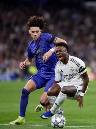 Vinicius Jr of Real Madrid CF and Maghnes Akliouche of AS Monaco FC Real Madrid v AS Monaco, UEFA Champions League, Group Stage, Football, Estadio Bernabeu, Madrid, Spain - 20 Jan 2026Madrid Estadio Bernabeu Spain EDITORIAL USE ONLY No use with unauthorised audio, video, data, fixture lists, club league logos or live services. Online in-match use limited to 120 images, no video emulation. No use in betting, games or single club league player publications. Copyright: xRubenxAlbarran Shutterstockx 16374322ar