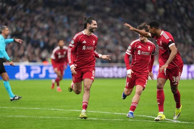 Dominik Szoboszlai of Liverpool celebrates with Ryan Gravenberch of Liverpool and Milos Kerkez of Liverpool after he puts his side 1-0 ahead with a free kick just before half-time Marseille v Liverpool, UEFA Champions League, Group Stage, Football, Orange Velodrome, Marseille, France - 21 Jan 2026Marseille Orange Vélodrome France EDITORIAL USE ONLY No use with unauthorised audio, video, data, fixture lists, club league logos or live services. Online in-match use limited to 120 images, no video emulation. No use in betting, games or single club league player publications. Copyright: xDavexWinter Shutterstockx 16348361kx