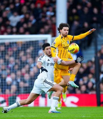 Ferdi Kadioglu of Brighton battles with Raul Jimenez of Fulham Fulham v Brighton and Hove Albion, Premier League, Football, Craven Cottage, London, UK - 24 Jan 2026London Craven Cottage United Kingdom EDITORIAL USE ONLY No use with unauthorised audio, video, data, fixture lists, club league logos or live services. Online in-match use limited to 120 images, no video emulation. No use in betting, games or single club league player publications. Copyright: xJavierxGarcia Shutterstockx 16425974at