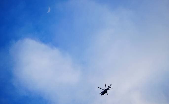 A helicopter above the ground passes under a crescent moon Fulham v Brighton and Hove Albion, Premier League, Football, Craven Cottage, London, UK - 24 Jan 2026London Craven Cottage United Kingdom EDITORIAL USE ONLY No use with unauthorised audio, video, data, fixture lists, club league logos or live services. Online in-match use limited to 120 images, no video emulation. No use in betting, games or single club league player publications. Copyright: xJavierxGarcia Shutterstockx 16425974eh