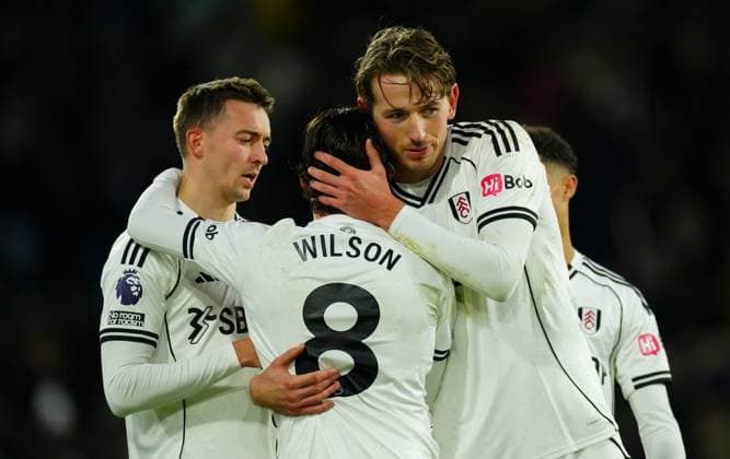 Harry Wilson of Fulham celebrates at full time with Timothy Castagne and Sander Berge Fulham v Brighton and Hove Albion, Premier League, Football, Craven Cottage, London, UK - 24 Jan 2026London Craven Cottage United Kingdom EDITORIAL USE ONLY No use with unauthorised audio, video, data, fixture lists, club league logos or live services. Online in-match use limited to 120 images, no video emulation. No use in betting, games or single club league player publications. Copyright: xJavierxGarcia Shutterstockx 16425974ig