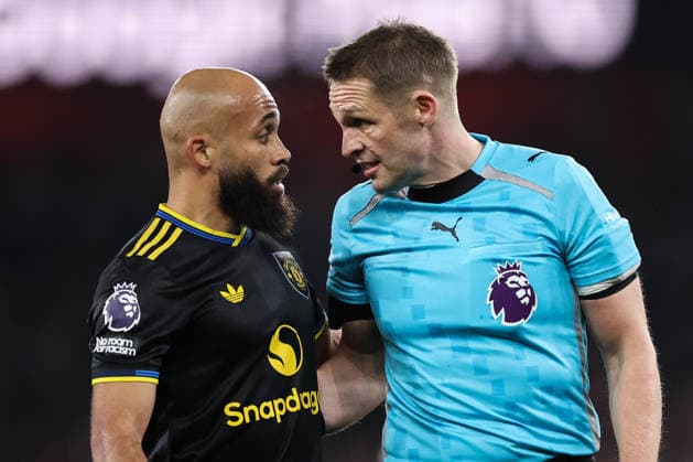 London, England, 25th January 2026. Bryan Mbeumo of Manchester United, ManU talks to referee Craig Pawson during the Arsenal vs Manchester United Premier League match at the Emirates Stadium, London. Picture credit should read: David Klein Sportimage EDITORIAL USE ONLY. No use with unauthorised audio, video, data, fixture lists, club league logos or live services. Online in-match use limited to 120 images, no video emulation. No use in betting, games or single club league player publications. SPI_042_DK_ARSENAL_vs_MAN_UNITED SPI-4480-0051