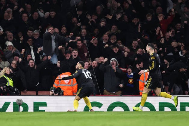 London, England, 25th January 2026. Matheus Cunha of Manchester United, ManU celebrates his goal to make it 2-3 during the Arsenal vs Manchester United Premier League match at the Emirates Stadium, London. Picture credit should read: David Klein Sportimage EDITORIAL USE ONLY. No use with unauthorised audio, video, data, fixture lists, club league logos or live services. Online in-match use limited to 120 images, no video emulation. No use in betting, games or single club league player publications. SPI_078_DK_ARSENAL_vs_MAN_UNITED SPI-4480-0079