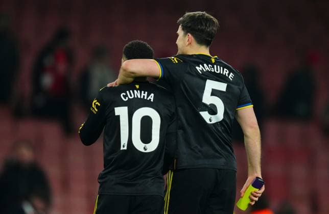 Matheus Cunha of Manchester United, ManU with Man of the match Harry Maguire Arsenal v Manchester United, Premier League, Football, Emirates Stadium, London, UK - 25 Jan 2026London Emirates Stadium United Kingdom EDITORIAL USE ONLY No use with unauthorised audio, video, data, fixture lists, club league logos or live services. Online in-match use limited to 120 images, no video emulation. No use in betting, games or single club league player publications. Copyright: xJavierxGarcia Shutterstockx 16426081ay