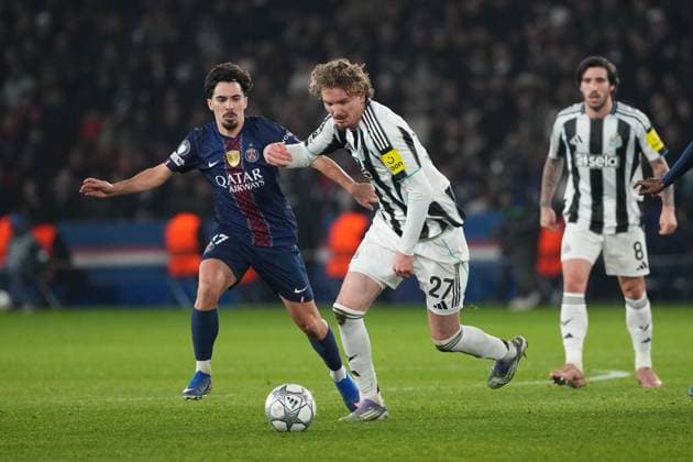 Nick Woltemade of Newcastle takes on Vitinha of PSG Paris Saint-Germain v Newcastle United, UEFA Champions League, Group Stage, Football, Parc des Princes, Paris, France - 28 Jan 2026Paris Parc des Princes France EDITORIAL USE ONLY No use with unauthorised audio, video, data, fixture lists, club league logos or live services. Online in-match use limited to 120 images, no video emulation. No use in betting, games or single club league player publications. Copyright: xDavexWinter Shutterstockx 16429499bb