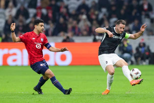 Benjamin Andre (OSC Lille) und Christian Guenter (SC Freiburg) kaempfen um den Ball, UEFA Europa League 2025 26 League Phase MD8, LOSC Lille v SC Freiburg, Stade Pierre Mauroy am 29. January 2026 in Lille, Frankreich. (Foto von Marco Steinbrenner DeFodi Images) Benjamin Andre (OSC Lille) und Christian Guenter (SC Freiburg) battle for the ball, UEFA Europa League 2025 26 League Phase MD8, LOSC Lille v SC Freiburg, Stade Pierre Mauroy, January 29, 2026 in Lille, France. (Photo by Marco Steinbrenner DeFodi Images) -