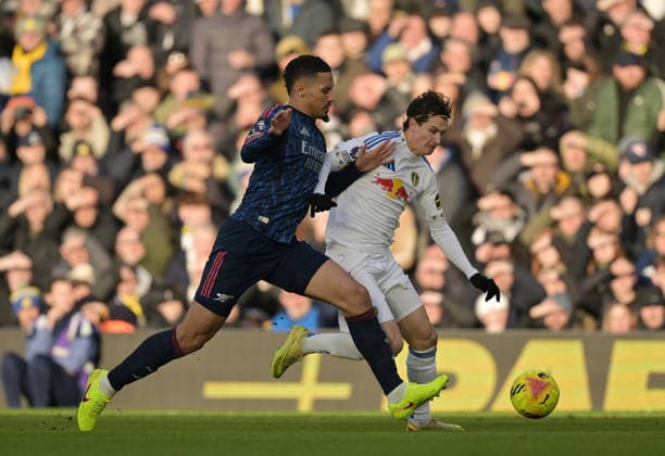 William Saliba of Arsenal and Brenden Aaronson of Leeds United Leeds United v Arsenal, Premier League, Football, Elland Road, Leeds, UK - 31 Jan 2026Leeds Elland Road United Kingdom EDITORIAL USE ONLY No use with unauthorised audio, video, data, fixture lists, club league logos or live services. Online in-match use limited to 120 images, no video emulation. No use in betting, games or single club league player publications. Copyright: xGreigxCowie Shutterstockx 16496741q