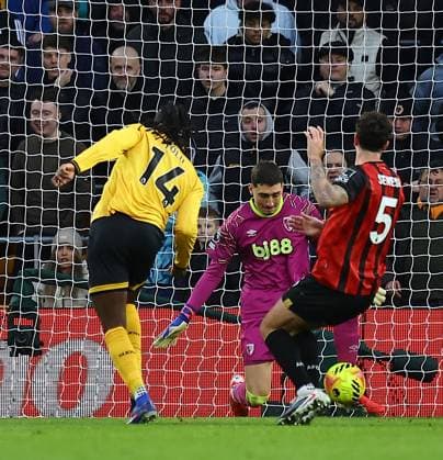 Djordje Petrovic of AFC Bournemouth saves a shot from Tolu Arokodare of Wolverhampton Wanderers Wolverhampton Wanderers v AFC Bournemouth, Premier League, Football, Molineux, Wolverhampton, UK - 31 Jan 2026Wolverhampton Molineux United Kingdom EDITORIAL USE ONLY No use with unauthorised audio, video, data, fixture lists, club league logos or live services. Online in-match use limited to 120 images, no video emulation. No use in betting, games or single club league player publications. Copyright: xMichaelxZemanek Shutterstockx 16496747x