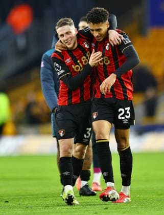 Adrien Truffert of AFC Bournemouth and James Hill of AFC Bournemouth celebrate after the match Wolverhampton Wanderers v AFC Bournemouth, Premier League, Football, Molineux, Wolverhampton, UK - 31 Jan 2026Wolverhampton Molineux United Kingdom EDITORIAL USE ONLY No use with unauthorised audio, video, data, fixture lists, club league logos or live services. Online in-match use limited to 120 images, no video emulation. No use in betting, games or single club league player publications. Copyright: xMichaelxZemanek Shutterstockx 16496747ap