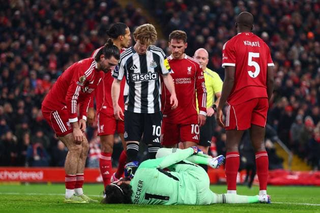 Anthony Gordon of Newcastle United and Alisson Becker of Liverpool after a foul Liverpool v Newcastle United, Premier League, Football, Anfield, Liverpool, UK - 31 Jan 2026Liverpool Anfield United Kingdom EDITORIAL USE ONLY No use with unauthorised audio, video, data, fixture lists, club league logos or live services. Online in-match use limited to 120 images, no video emulation. No use in betting, games or single club league player publications. Copyright: xPaulxCurrie Shutterstockx 16496754bs