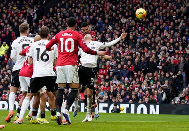 Manchester, England, 1st February 2026. Casemiro of Manchester United, ManU heads the opening goal during the Manchester United vs Fulham Premier League match at Old Trafford, Manchester. Picture credit should read: Andrew Yates Sportimage EDITORIAL USE ONLY. No use with unauthorised audio, video, data, fixture lists, club league logos or live services. Online in-match use limited to 120 images, no video emulation. No use in betting, games or single club league player publications. SPI_026_AY_MAN_UTD_FULHAM SPI-4502-0025