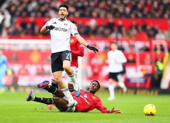 Kobbie Mainoo of Manchester United, ManU and Raul Jimenez of Fulham Manchester United v Fulham, Premier League, Football, Old Trafford, Manchester, UK - 01 Feb 2026Manchester Old Trafford United Kingdom EDITORIAL USE ONLY No use with unauthorised audio, video, data, fixture lists, club league logos or live services. Online in-match use limited to 120 images, no video emulation. No use in betting, games or single club league player publications. Copyright: xPaulxCurrie Shutterstockx 16496861df