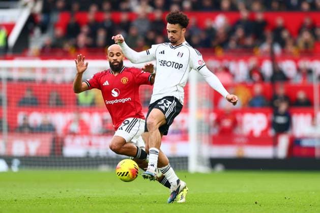 Bryan Mbeumo of Manchester United, ManU and Antonee Robinson of Fulham Manchester United v Fulham, Premier League, Football, Old Trafford, Manchester, UK - 01 Feb 2026Manchester Old Trafford United Kingdom EDITORIAL USE ONLY No use with unauthorised audio, video, data, fixture lists, club league logos or live services. Online in-match use limited to 120 images, no video emulation. No use in betting, games or single club league player publications. Copyright: xPaulxCurrie Shutterstockx 16496861dy