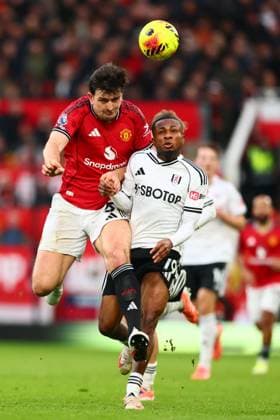 Harry Maguire of Manchester United, ManU and Samuel Chukwueze of Fulham Manchester United v Fulham, Premier League, Football, Old Trafford, Manchester, UK - 01 Feb 2026Manchester Old Trafford United Kingdom EDITORIAL USE ONLY No use with unauthorised audio, video, data, fixture lists, club league logos or live services. Online in-match use limited to 120 images, no video emulation. No use in betting, games or single club league player publications. Copyright: xPaulxCurrie Shutterstockx 16496861em