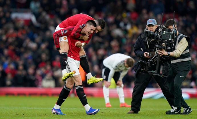Manchester, England, 1st February 2026. Benjamin Sesko of Manchester United, ManU (R) reacts at the final whistle with Diogo Dalot of Manchester United after scoring the winning goal during the Manchester United vs Fulham Premier League match at Old Trafford, Manchester. Picture credit should read: Andrew Yates Sportimage EDITORIAL USE ONLY. No use with unauthorised audio, video, data, fixture lists, club league logos or live services. Online in-match use limited to 120 images, no video emulation. No use in betting, games or single club league player publications. SPI_049_AY_MAN_UTD_FULHAM SPI-4502-0048