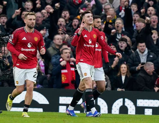 Manchester, England, 1st February 2026. Benjamin Sesko of Manchester United, ManU (C) celebrates after scoring the third goal during the Manchester United vs Fulham Premier League match at Old Trafford, Manchester. Picture credit should read: Andrew Yates Sportimage EDITORIAL USE ONLY. No use with unauthorised audio, video, data, fixture lists, club league logos or live services. Online in-match use limited to 120 images, no video emulation. No use in betting, games or single club league player publications. SPI_055_AY_MAN_UTD_FULHAM SPI-4502-0054