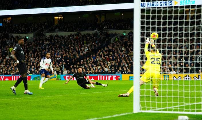 Manchester City goalkeeper Gianluigi Donnarumma denies Destiny Udogie of Tottenham Hotspur Tottenham Hotspur v Manchester City, Premier League, Football, Tottenham Hotspur Stadium, London, UK - 01 Feb 2026London Tottenham Hotspur Stadium United Kingdom EDITORIAL USE ONLY No use with unauthorised audio, video, data, fixture lists, club league logos or live services. Online in-match use limited to 120 images, no video emulation. No use in betting, games or single club league player publications. Copyright: xJavierxGarcia Shutterstockx 16496864ad