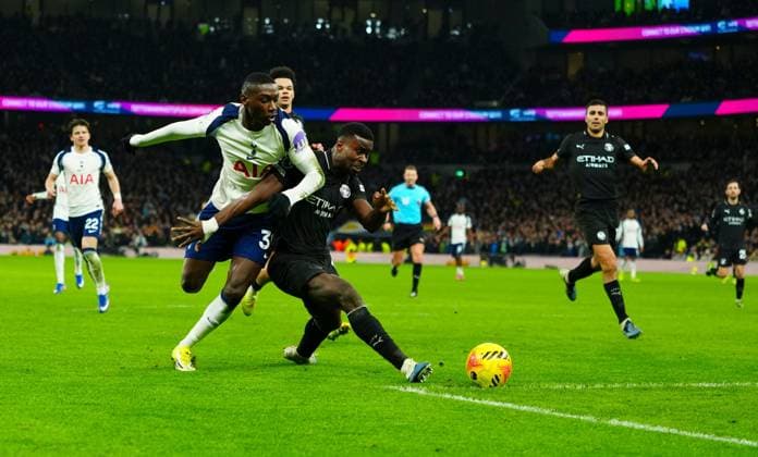Marc Guehi of Manchester City defends under pressure from Randal Kolo Muani of Tottenham Hotspur Tottenham Hotspur v Manchester City, Premier League, Football, Tottenham Hotspur Stadium, London, UK - 01 Feb 2026London Tottenham Hotspur Stadium United Kingdom EDITORIAL USE ONLY No use with unauthorised audio, video, data, fixture lists, club league logos or live services. Online in-match use limited to 120 images, no video emulation. No use in betting, games or single club league player publications. Copyright: xJavierxGarcia Shutterstockx 16496864ae