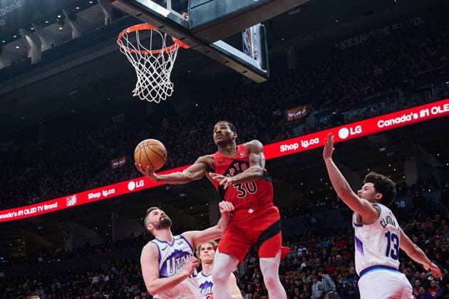 February 1, 2026, Toronto, On, Canada: Toronto Raptors Ochai Agbaji (30) drives to the net past Utah Jazz s Walter Clayton Jr. (13) during second half NBA, Basketball Herren, USA basketball action in Toronto, on Sunday, Feb. 1, 2026. Canada News - February 1, 2026 - ZUMAc35_ 20260201_zaf_c35_096 Copyright: xSammyxKoganx