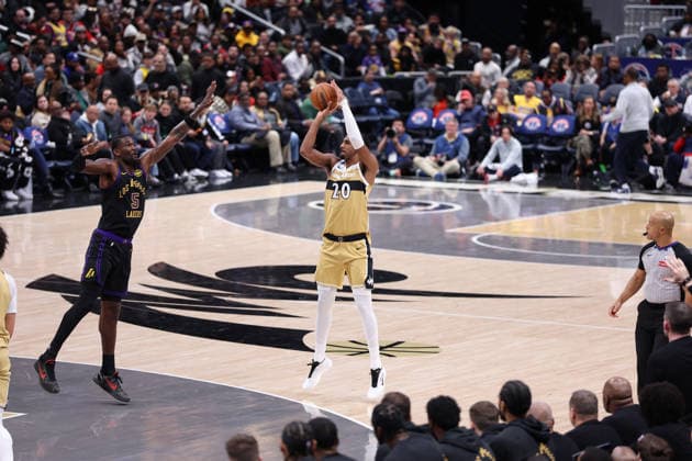 January 30, 2026, Washington, District Of Columbia, USA: ALEXANDRE SARR 20 of the Washington Wizards shoots a three point basket during the game against the Los Angeles Lakers at Capital One Arena Washington USA - ZUMAs352 20260130_zsp_s352_013 Copyright: xSabinaxShyshx