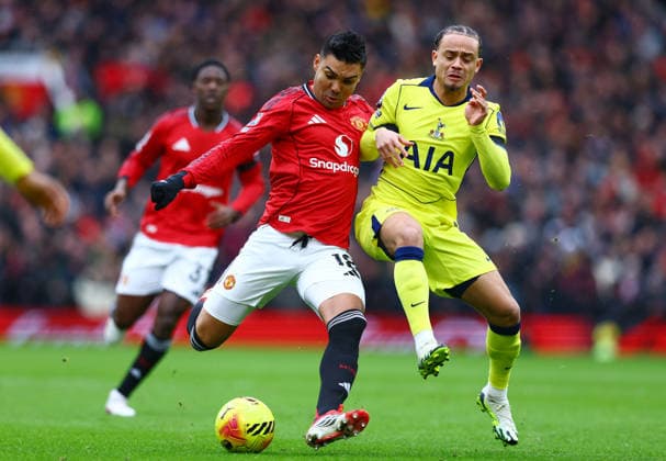 Casemiro of Manchester United, ManU and Xavi Simons of Tottenham Hotspur Manchester United v Tottenham Hotspur, Premier League, Football, Old Trafford, Manchester, UK - 07 Feb 2026Manchester Old Trafford United Kingdom EDITORIAL USE ONLY No use with unauthorised audio, video, data, fixture lists, club league logos or live services. Online in-match use limited to 120 images, no video emulation. No use in betting, games or single club league player publications. Copyright: xMattxWest Shutterstockx 16524093s