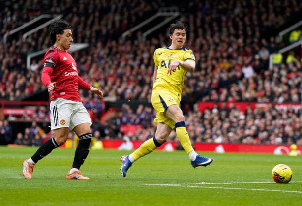 Manchester, England, 7th February 2026. Connor Gallagher of Tottenham shoots which is saved during the Manchester United, ManU vs Tottenham Hotspur Premier League match at Old Trafford, Manchester. Picture credit should read: Andrew Yates Sportimage EDITORIAL USE ONLY. No use with unauthorised audio, video, data, fixture lists, club league logos or live services. Online in-match use limited to 120 images, no video emulation. No use in betting, games or single club league player publications. SPI_043_AY_Man_Utd_Spurs SPI-4511-0043