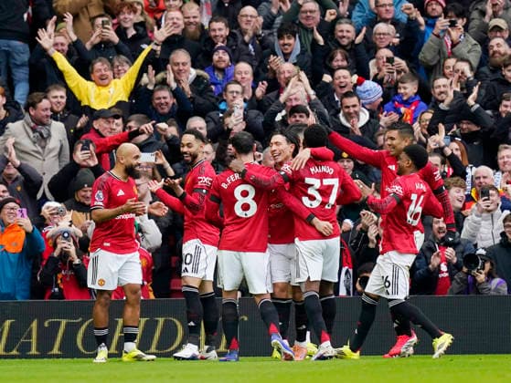 Manchester, England, 7th February 2026. Bryan Mbeumo of Manchester United, ManU (l) celebrates scoring the first goal during the Manchester United vs Tottenham Hotspur Premier League match at Old Trafford, Manchester. Picture credit should read: Andrew Yates Sportimage EDITORIAL USE ONLY. No use with unauthorised audio, video, data, fixture lists, club league logos or live services. Online in-match use limited to 120 images, no video emulation. No use in betting, games or single club league player publications. SPI_066_AY_Man_Utd_Spurs SPI-4511-0066