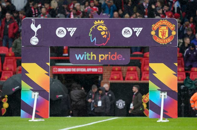 Manchester, England, 7th February 2026. Officials and players line up in front of the colours of the Premier League With Pride campaign, which focuses on LGBTQ+ inclusion during the Manchester United, ManU vs Tottenham Hotspur Premier League match at Old Trafford, Manchester. Picture credit should read: Andrew Yates Sportimage EDITORIAL USE ONLY. No use with unauthorised audio, video, data, fixture lists, club league logos or live services. Online in-match use limited to 120 images, no video emulation. No use in betting, games or single club league player publications. SPI_070_AY_Man_Utd_Spurs SPI-4511-0070