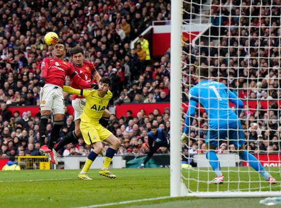 Manchester, England, 7th February 2026. Casemiro of Manchester United, ManU and Harry Maguire of Manchester United both go for the same ball during the Manchester United vs Tottenham Hotspur Premier League match at Old Trafford, Manchester. Picture credit should read: Andrew Yates Sportimage EDITORIAL USE ONLY. No use with unauthorised audio, video, data, fixture lists, club league logos or live services. Online in-match use limited to 120 images, no video emulation. No use in betting, games or single club league player publications. SPI_076_AY_Man_Utd_Spurs SPI-4511-0076