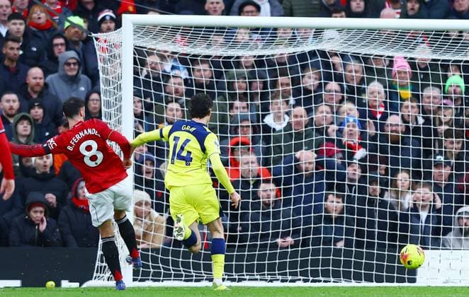 Bruno Fernandes of Manchester United, ManU scores a goal to make it 2-0 Manchester United v Tottenham Hotspur, Premier League, Football, Old Trafford, Manchester, UK - 07 Feb 2026Manchester Old Trafford United Kingdom EDITORIAL USE ONLY No use with unauthorised audio, video, data, fixture lists, club league logos or live services. Online in-match use limited to 120 images, no video emulation. No use in betting, games or single club league player publications. Copyright: xMattxWest Shutterstockx 16524093as