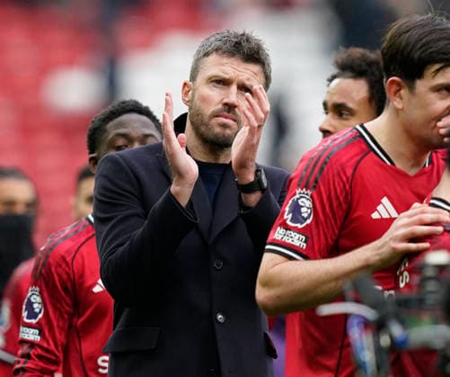 Manchester, England, 7th February 2026. Michael Carrick head coach of Manchester United, ManU calls the fans during the Manchester United vs Tottenham Hotspur Premier League match at Old Trafford, Manchester. Picture credit should read: Andrew Yates Sportimage EDITORIAL USE ONLY. No use with unauthorised audio, video, data, fixture lists, club league logos or live services. Online in-match use limited to 120 images, no video emulation. No use in betting, games or single club league player publications. SPI_083_AY_Man_Utd_Spurs SPI-4511-0083